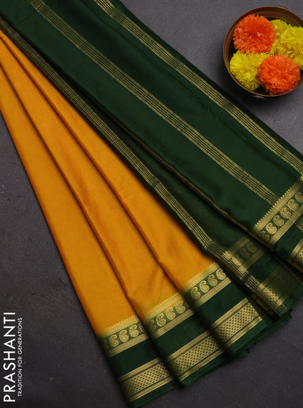Semi mysore silk saree mustard yellow and green with plain body and rettapet zari woven border