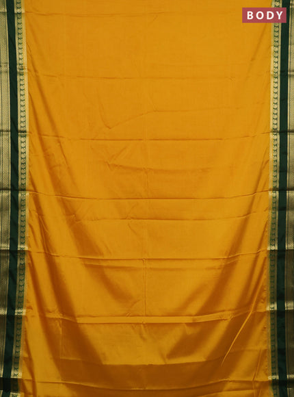 Semi mysore silk saree mustard yellow and green with plain body and rettapet zari woven border