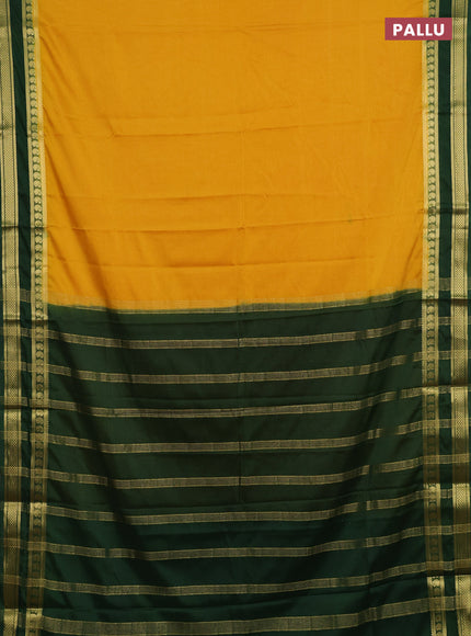 Semi mysore silk saree mustard yellow and green with plain body and rettapet zari woven border