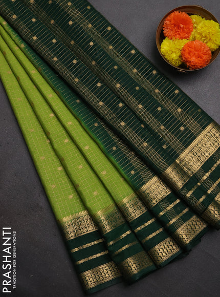 Semi mysore silk saree light green and bottle green with allover zari checks & buttas and long zari woven border