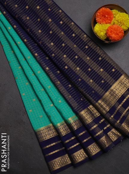 Semi mysore silk saree teal green and navy blue with allover zari checks & buttas and long zari woven border