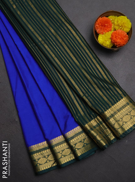 Semi mysore silk saree blue and bottle green with plain body and zari woven border