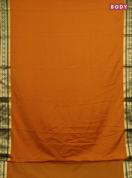 Semi mysore silk saree mustard yellow and bottle green with plain body and zari woven border
