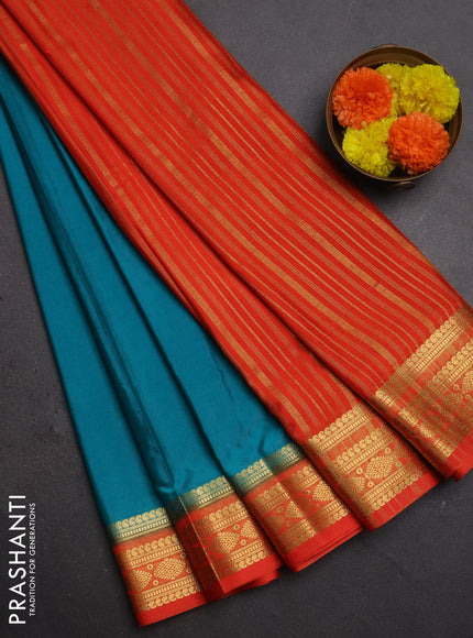 Semi mysore silk saree teal green and orange with plain body and zari woven border