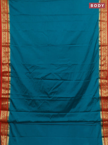 Semi mysore silk saree teal green and orange with plain body and zari woven border