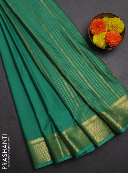 Semi mysore silk saree pastel green with plain body and temple design zari woven border
