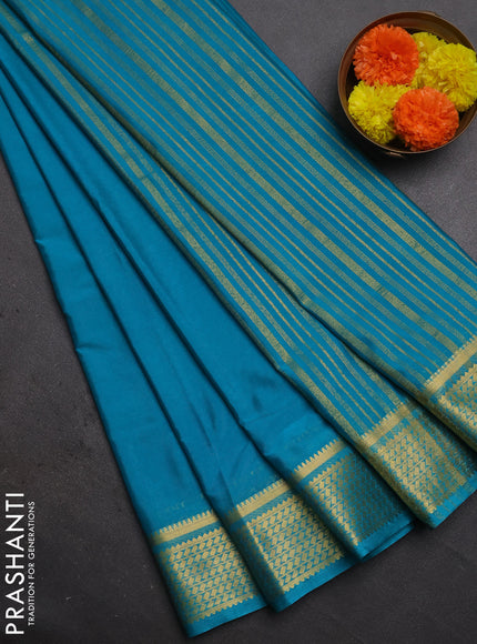 Semi mysore silk saree teal blue with plain body and temple design zari woven border