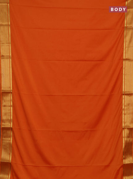 Semi mysore silk saree orange with plain body and temple design zari woven border