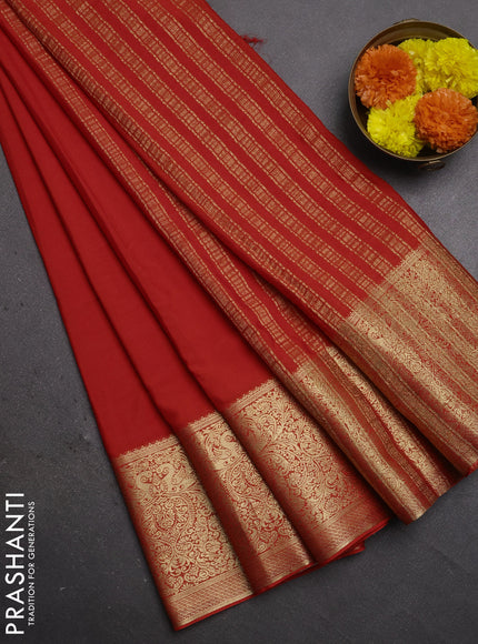 Semi mysore silk saree orange with plain body and long zari woven border
