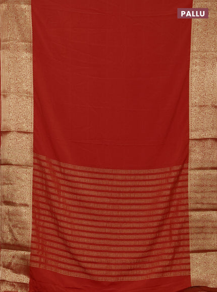 Semi mysore silk saree orange with plain body and long zari woven border