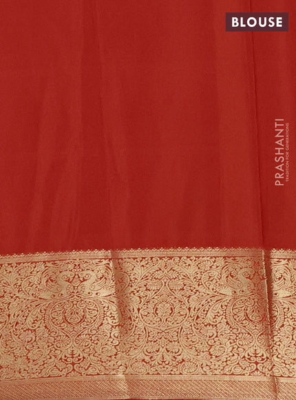 Semi mysore silk saree orange with plain body and long zari woven border
