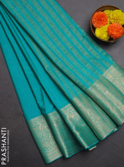 Semi mysore silk saree teal blue with plain body and long zari woven border
