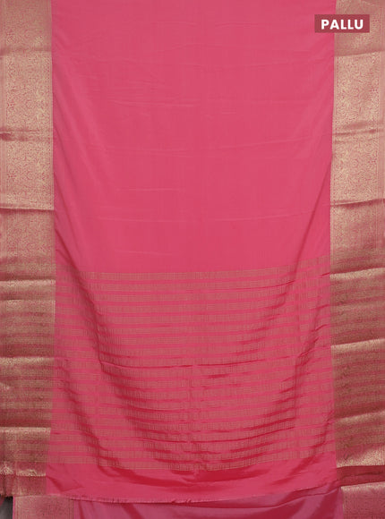 Semi mysore silk saree light pink with plain body and long zari woven border