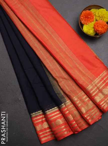 Semi mysore silk saree black and orange with plain body and zari woven border