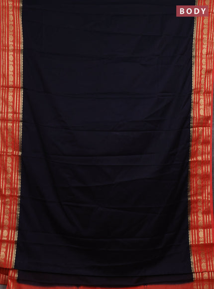 Semi mysore silk saree black and orange with plain body and zari woven border