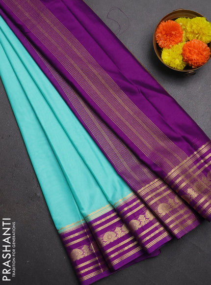 Semi mysore silk saree teal shade and purple with plain body and zari woven border