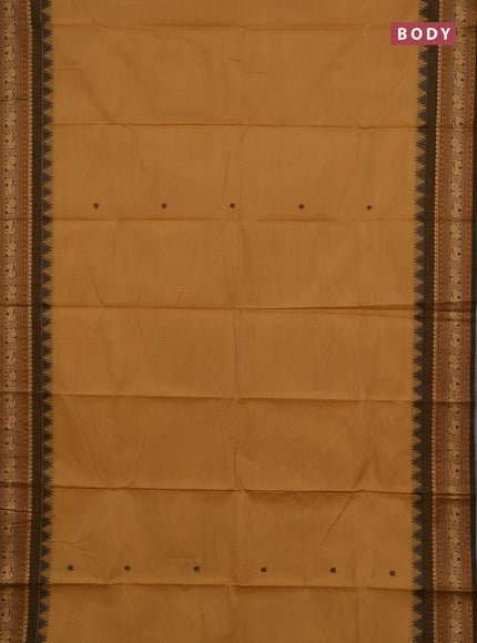 Chettinad cotton saree sandal and mustard green with zari woven buttas and thread woven border