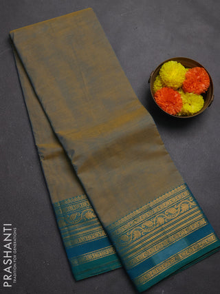 Chettinad cotton saree dual shade of bluish mustard and teal blue with plain body and zari woven border