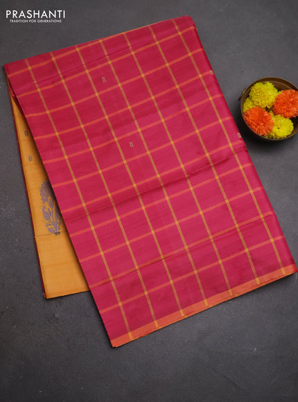 Banana pith saree pink and orange with allover checked pattern and piping border