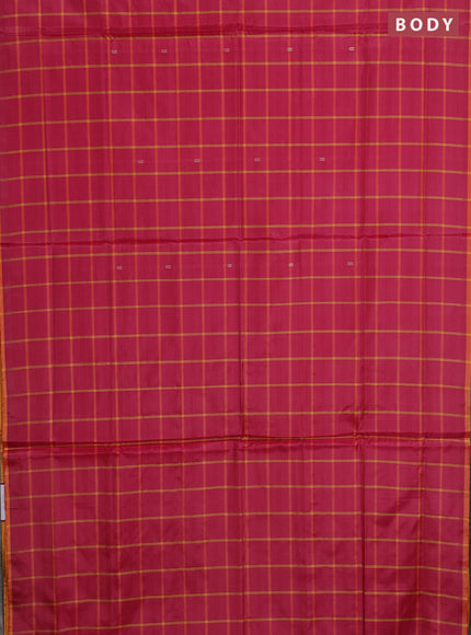 Banana pith saree pink and orange with allover checked pattern and piping border