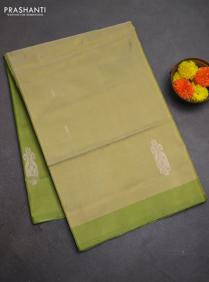 Banana pith saree elaichi green and light green with thread woven buttas and contrast border