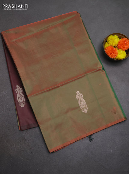 Banana pith saree dual shade of rust shade and pastel maroon with thread woven buttas and piping border