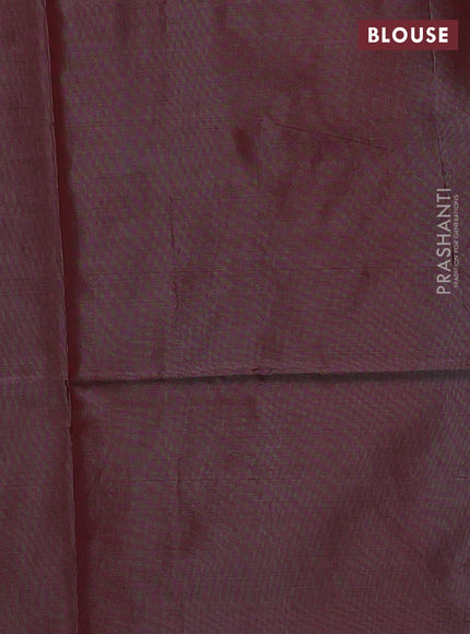 Banana pith saree dual shade of rust shade and pastel maroon with thread woven buttas and piping border