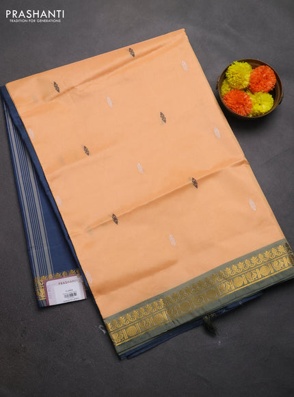 Banana pith saree pale orange and peacock green with thread woven buttas and small zari woven border