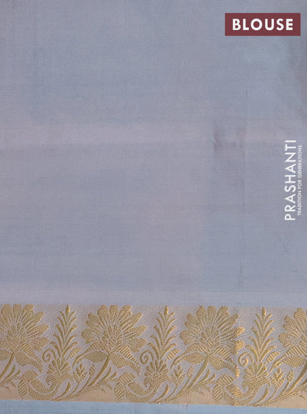 Banana pith saree pastel brown and pastel blue with thread woven buttas and zari woven border