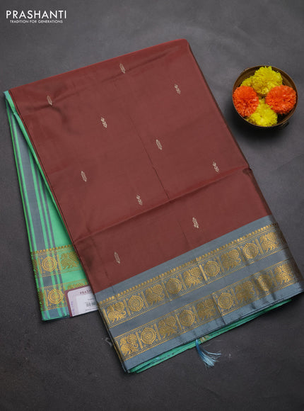 Banana pith saree brown and teal green with thread woven buttas and rettapet zari woven border
