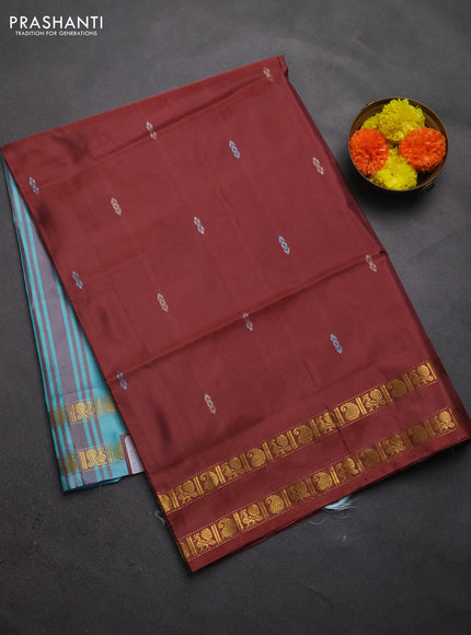 Banana pith saree rustic orange and teal blue with thread woven buttas and rettapet zari woven border