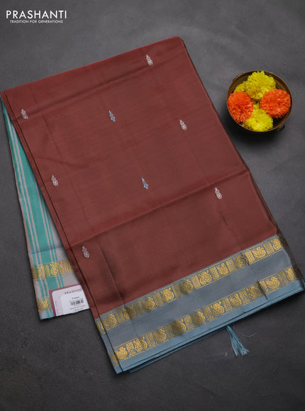 Banana pith saree brown and pastel blue with thread woven buttas and rettapet zari woven border