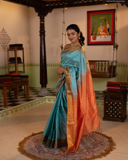 Banana pith saree teal green and rust shade with thread woven buttas and zari woven border