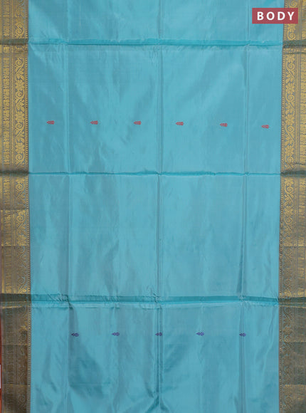 Banana pith saree teal green and rust shade with thread woven buttas and zari woven border