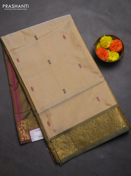 Banana pith saree sandal and olive green with thread woven buttas and zari woven border