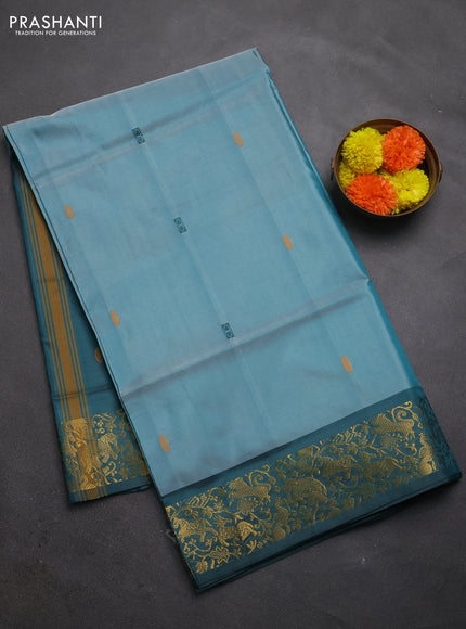 Banana pith saree teal green and peacock green with thread woven buttas and zari woven border