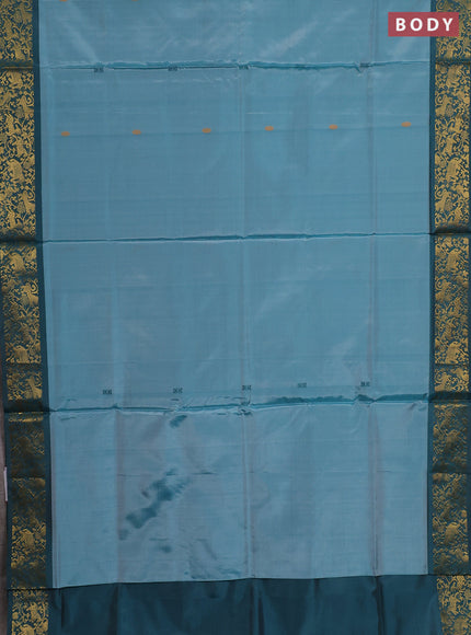 Banana pith saree teal green and peacock green with thread woven buttas and zari woven border