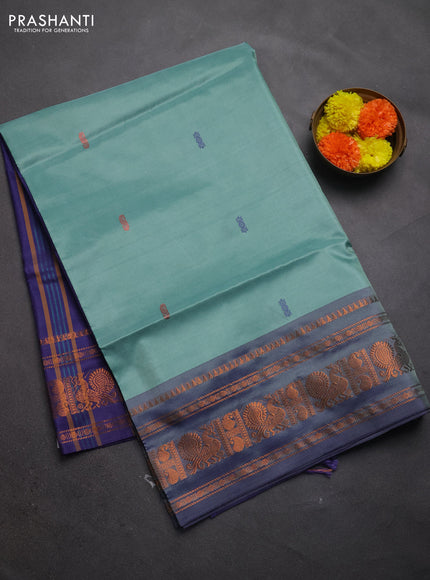 Banana pith saree pastel green and violet with thread woven buttas and long copper zari woven border
