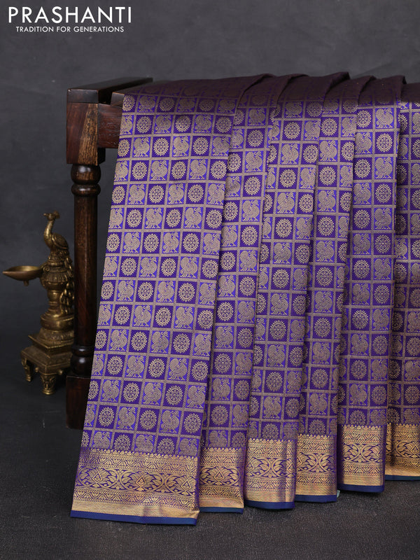 Pure kanchipuram silk saree blue with allover zari checks & buttas and rich zari woven border