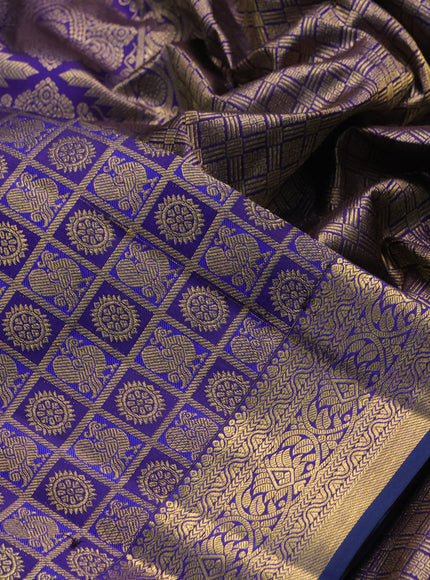 Pure kanchipuram silk saree blue with allover zari checks & buttas and rich zari woven border