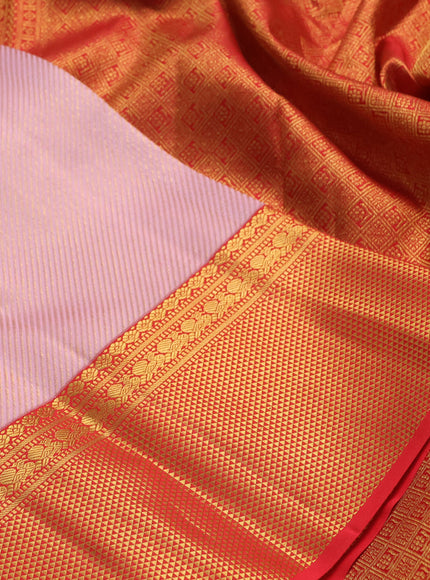 Pure kanchipuram silk saree light pink and red with allover zari woven leheriya weaves and rich zari woven border