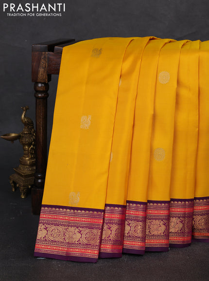 Pure kanchipuram silk saree yellow and purple with annam & rudhraksha zari woven buttas and rich zari woven korvai border