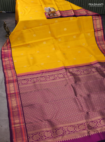 Pure kanchipuram silk saree yellow and purple with annam & rudhraksha zari woven buttas and rich zari woven korvai border