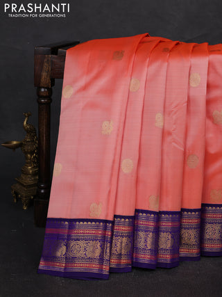 Pure kanchipuram silk saree peach orange and blue with annam & rudhraksha zari woven buttas and rich zari woven korvai border