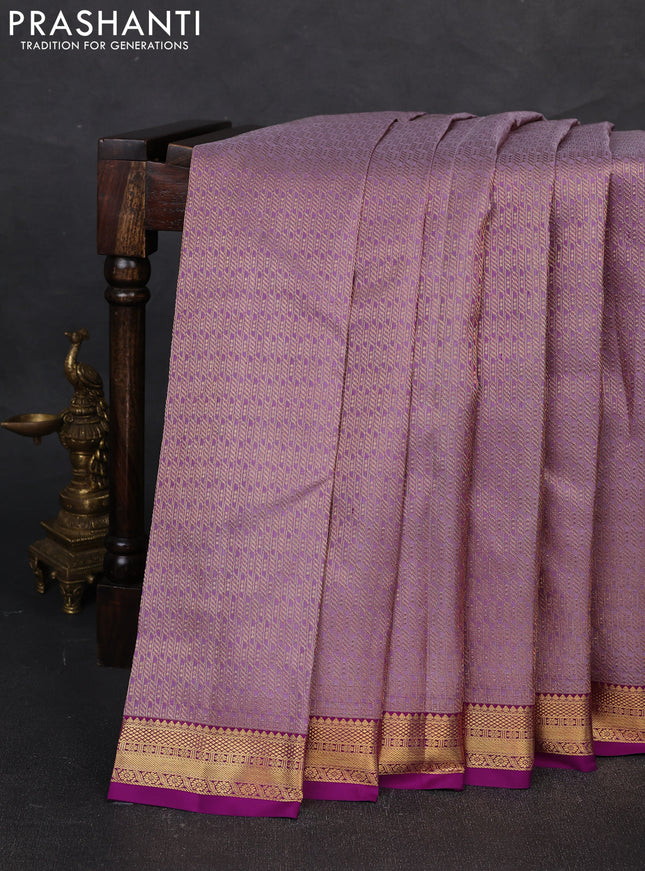 Pure kanchipuram silk saree pastel lavender and purple with allover zari woven brocade weaves and small zari woven border