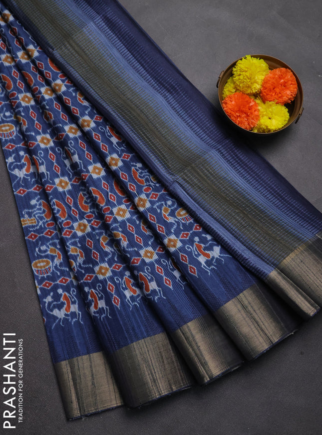 Semi matka saree peacock blue with allover patola prints and zari woven border