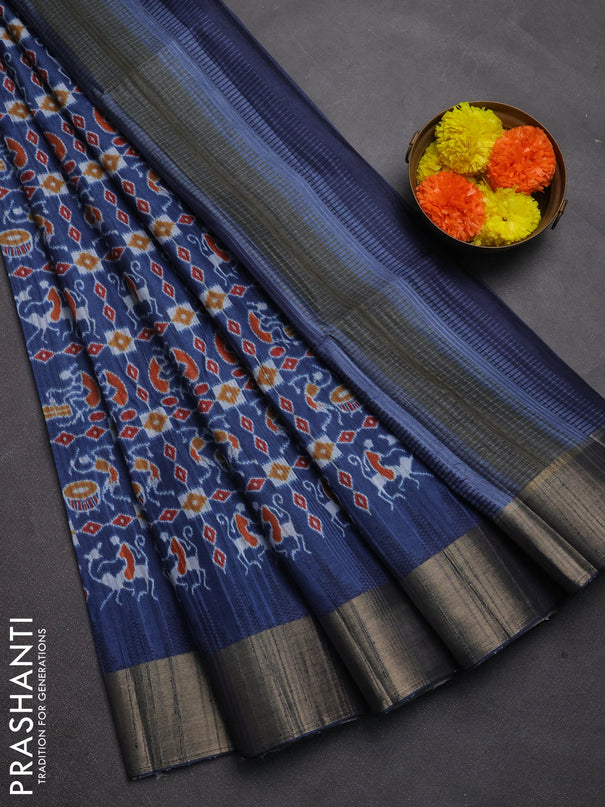 Semi matka saree peacock blue with allover patola prints and zari woven border