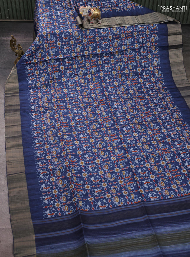 Semi matka saree peacock blue with allover patola prints and zari woven border