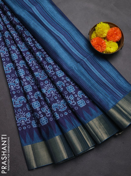 Semi matka saree navy blue and peacock blue with allover patola prints and zari woven border