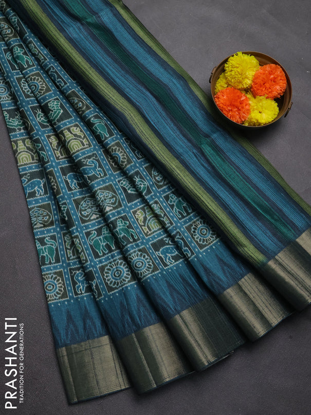 Semi matka saree peacock blue with allover patola prints and zari woven border